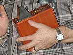 Bill's hand gives you an idea of the petite size of the camera