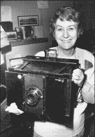Marg Lansdale with a hand held 8x10