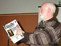 George showing front cover